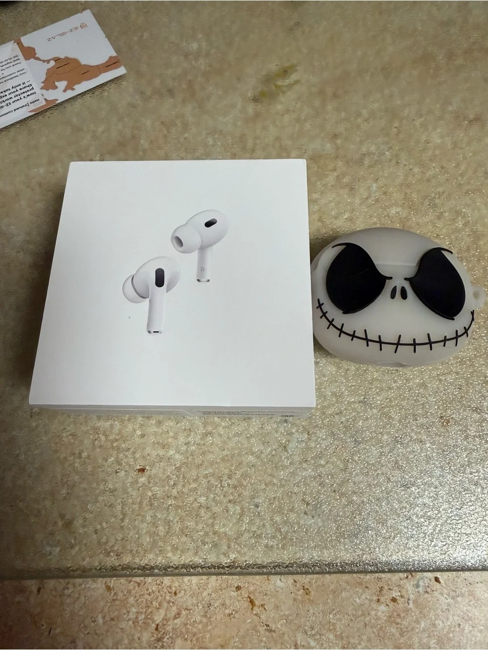 Apple AirPods Pro 2 White Earbuds with Jack Skellington Case
